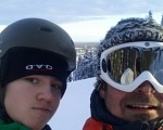 Me and my son riding snowboard