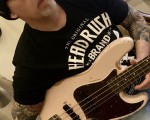 Me and my old Fender bass. Love that thing.